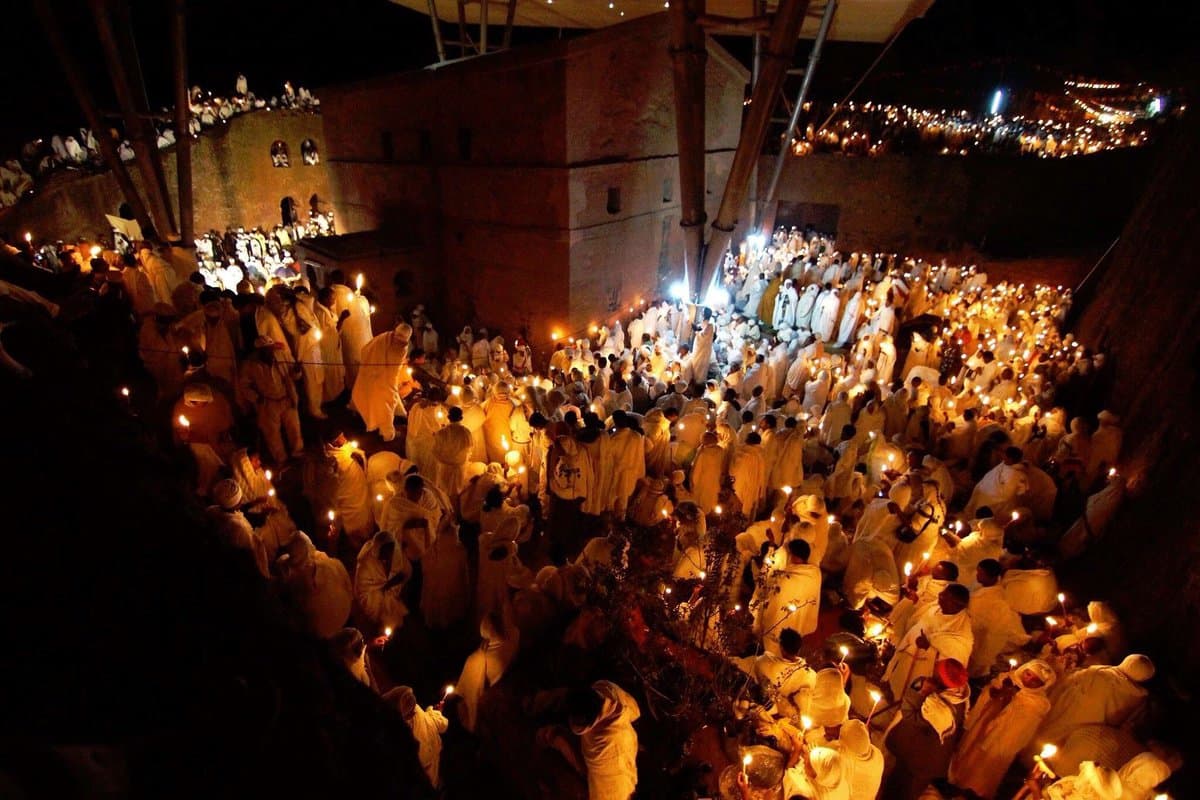 Candlelight Genna vigil around a rock-hewn church in Lalibela